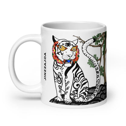 KoreaJoa White Tiger mug, a white ceramic coffee cup featuring a traditional Korean mythological tiger design with floral accents and tribal patterns.
